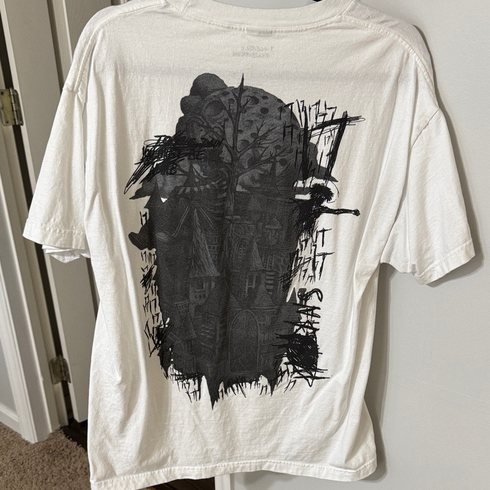 White Short-Sleeve Graphic Tee with Black Back Artwork